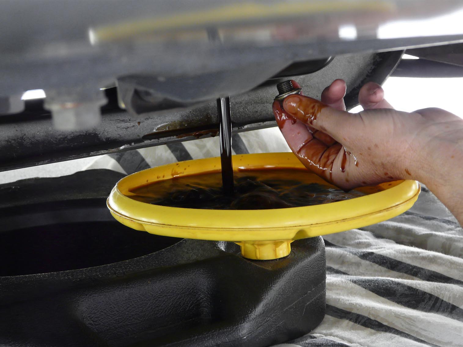 What causes milky brown engine oil?